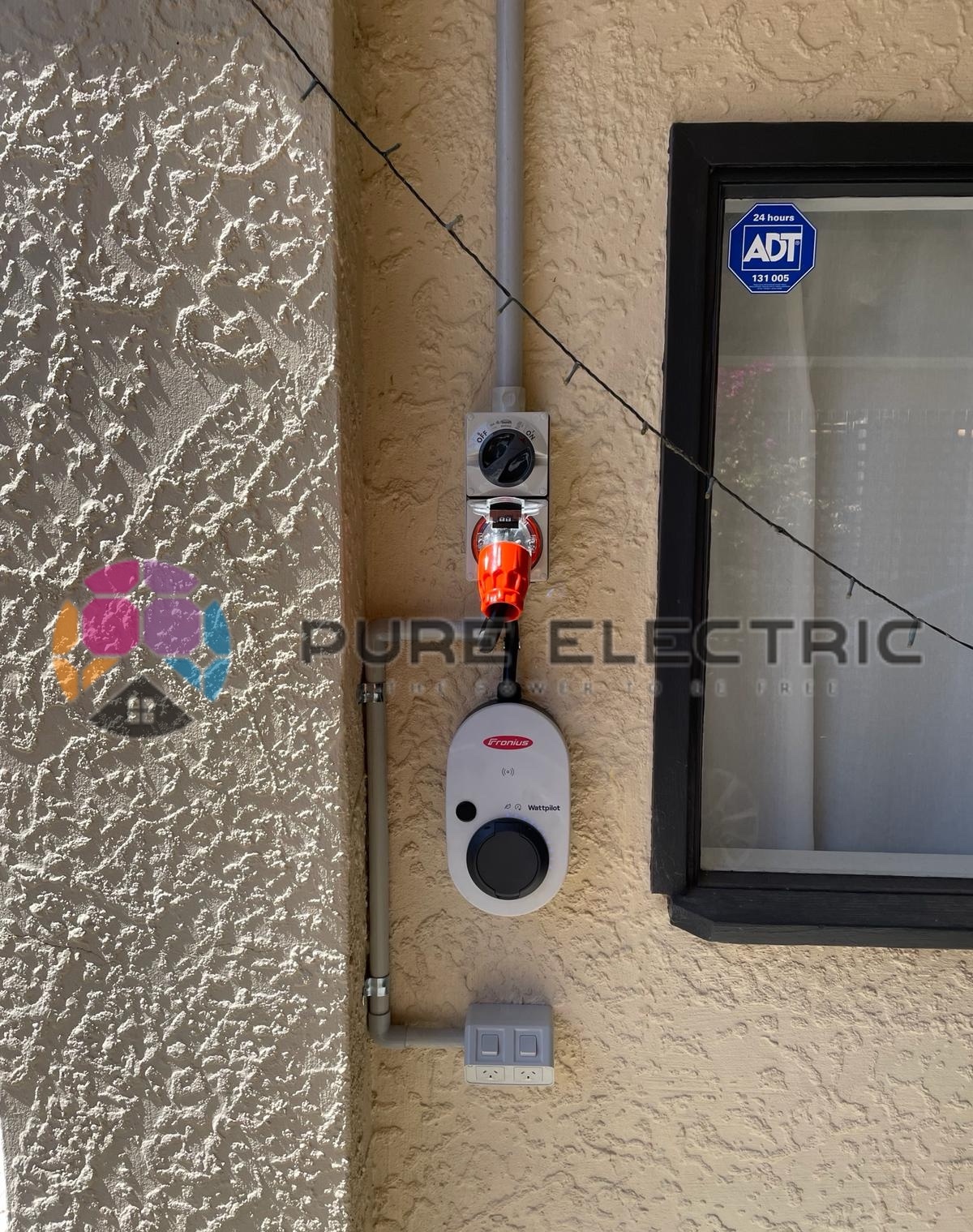 Fronius Wattpilot EV Charger Installation on Outdoor Wall by Pure Electric